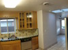 Panoramic view of the breakfast/sun room from the kitchen.